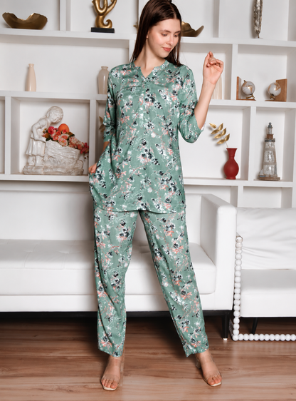 Woman wearing a mint green floral co-ord set with relaxed fit top and matching pants in a stylish indoor photoshoot.
Stylish women’s floral printed lounge wear co-ord set in soft mint green color with comfortable fit.
Premium women floral co-ord set featuring elegant print, breathable fabric, and trendy casual design.
Women pastel green printed top and pant co-ord set perfect for casual wear, travel, and lounging.
Elegant women’s floral night suit style co-ord set with soft fabric and modern relaxed silhoue
