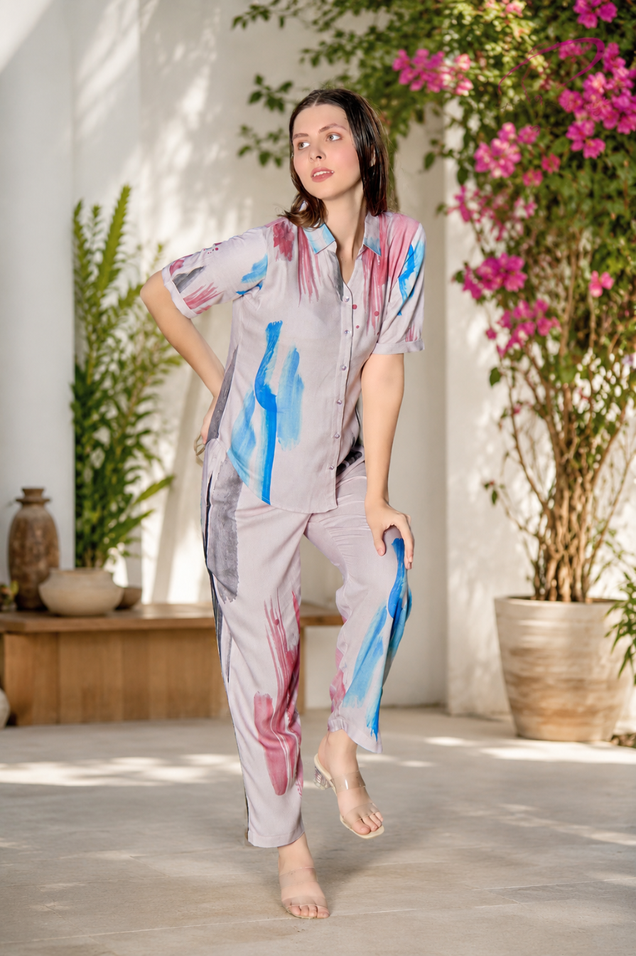 * Woman wearing a pastel abstract print co-ord set with matching shirt and pants in a stylish outdoor setting.
* Trendy women’s abstract printed Turkish cotton co-ord set with relaxed fit and modern fashion look.
* Stylish women casual co-ord set featuring multicolor brush print design and comfortable breathable fabric.
* Women premium abstract print lounge wear set with soft shirt and matching pants for daily wear.
* Fashionable women’s pastel co-ord outfit with artistic print and relaxed silhouette for ca