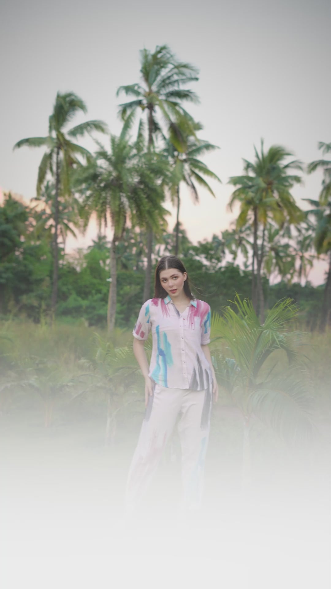 * Woman wearing a pastel abstract print co-ord set with matching shirt and pants in a stylish outdoor setting.
* Trendy women’s abstract printed Turkish cotton co-ord set with relaxed fit and modern fashion look.
* Stylish women casual co-ord set featuring multicolor brush print design and comfortable breathable fabric.
* Women premium abstract print lounge wear set with soft shirt and matching pants for daily wear.
* Fashionable women’s pastel co-ord outfit with artistic print and relaxed silhouette for ca